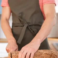Eleganckie fartuchy kuchenne: jak wybrać idealny model do gotowania